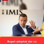 Buget adoptat dar cu tensiuni politice