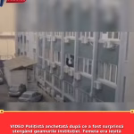 VIDEO Polițistă anchetată după ce a fost surprinsă ștergând geamurile instituției. Femeia era ieșită pe fereastră, la etaj, fără echipament